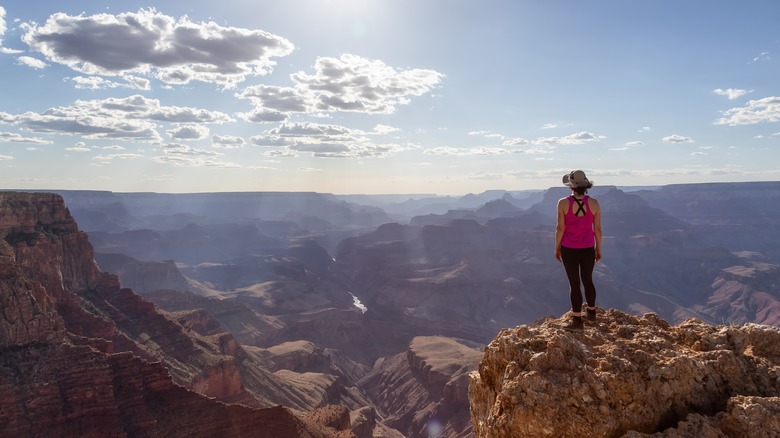 Woman looking at Grand Canyon